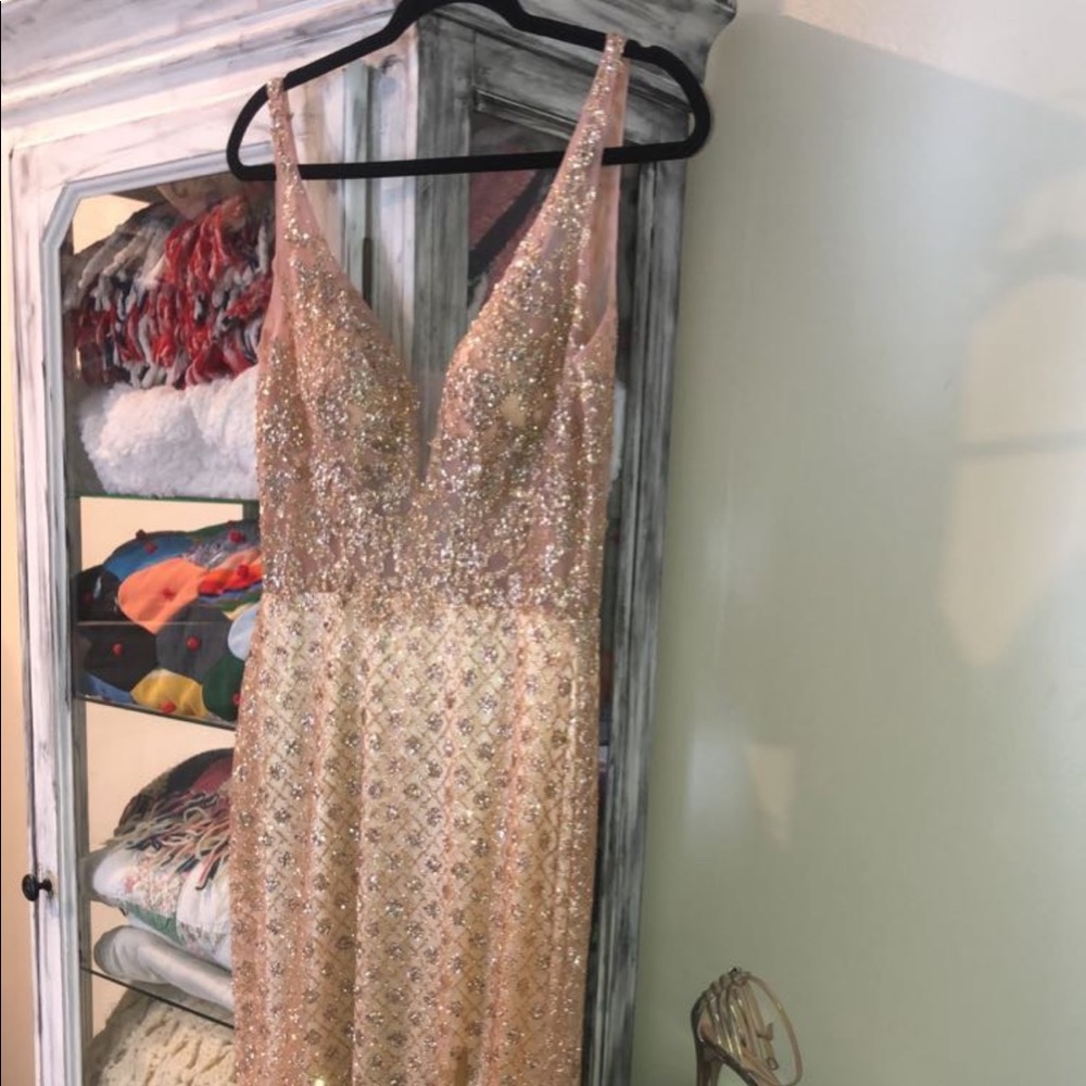 gold sparkly/detailed prom dress! worn once and got so many compliments! size 4